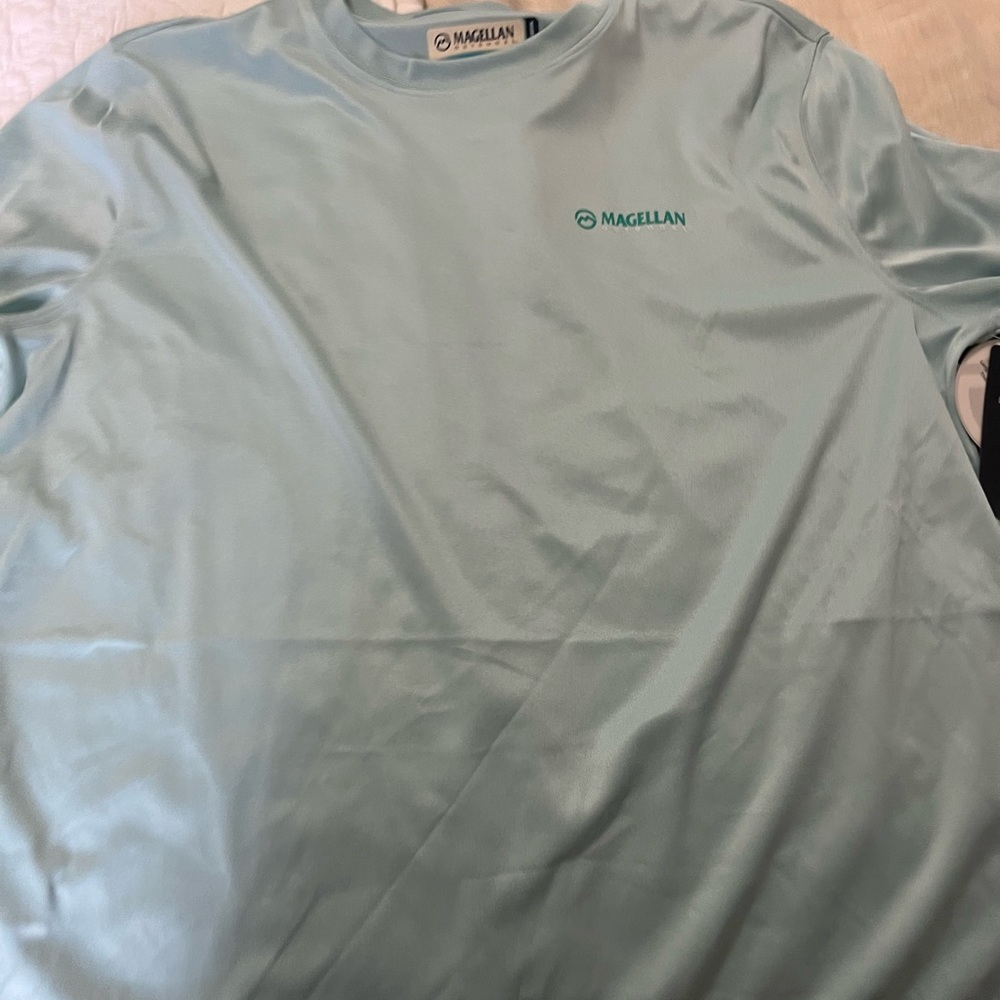 Woman’s  Magellan Large Fish Gear turquoise  long sleeve fishing/swim Shirt